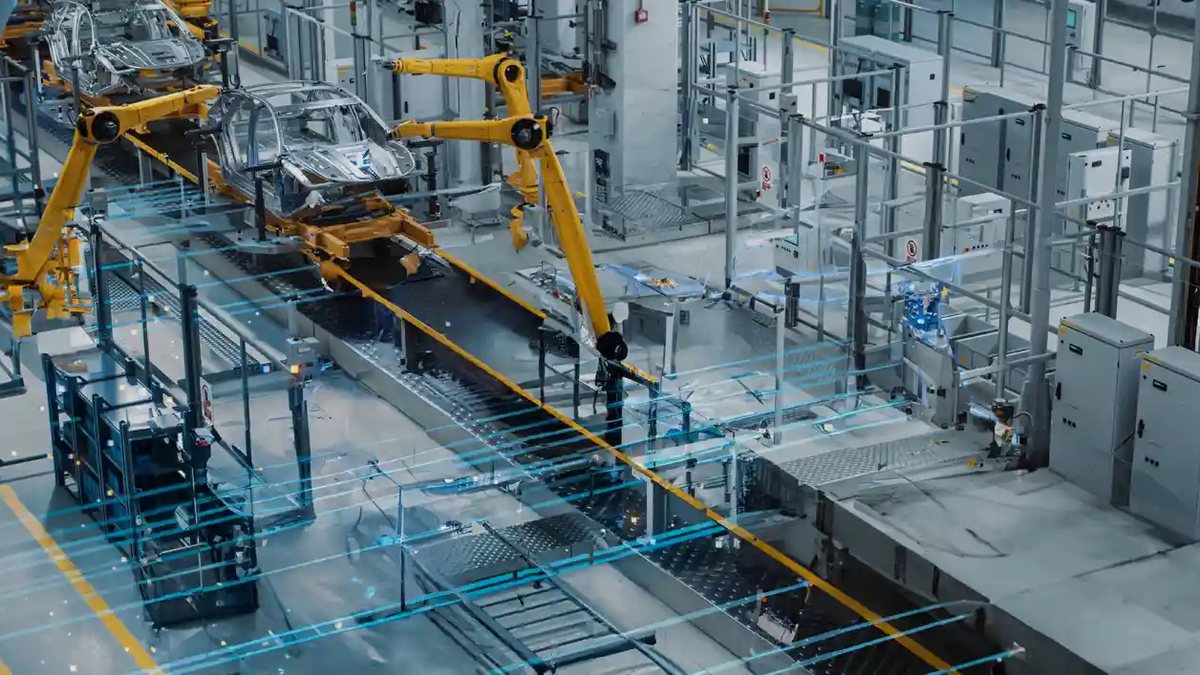 Industrial robot arms in automated factory